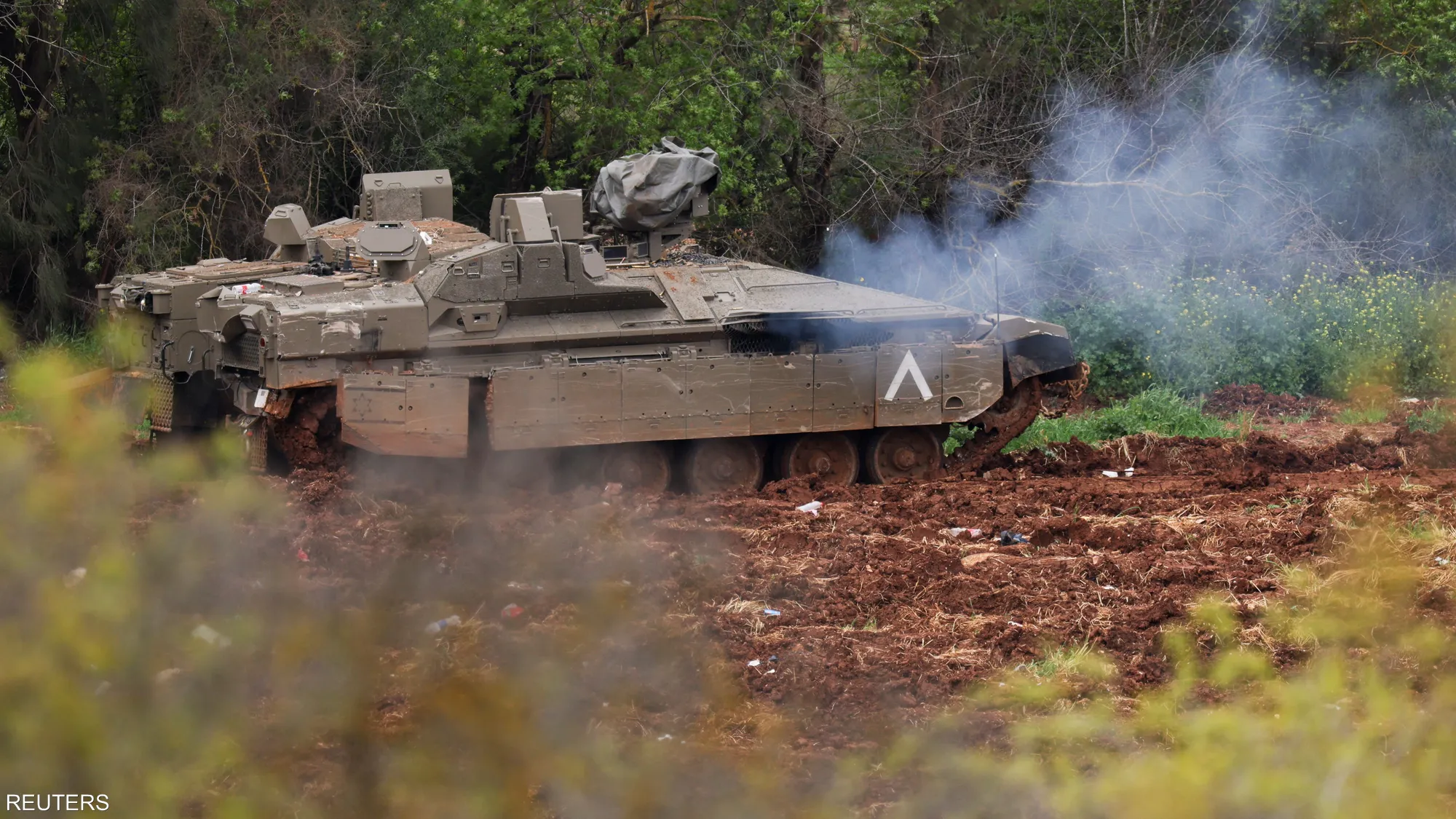 An Israeli tank positioned near the border area in southern Lebanon amid ongoing military tensions and reported ceasefire violations.