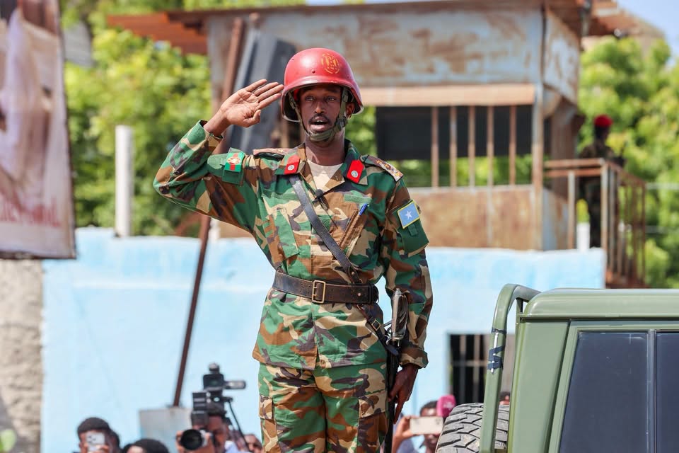 A Somali National Army soldier salutes during the 66th anniversary celebrations of Somalia's Independence Day in Mogadishu on July 1, 2026. (Photo: Lamaane News Network)