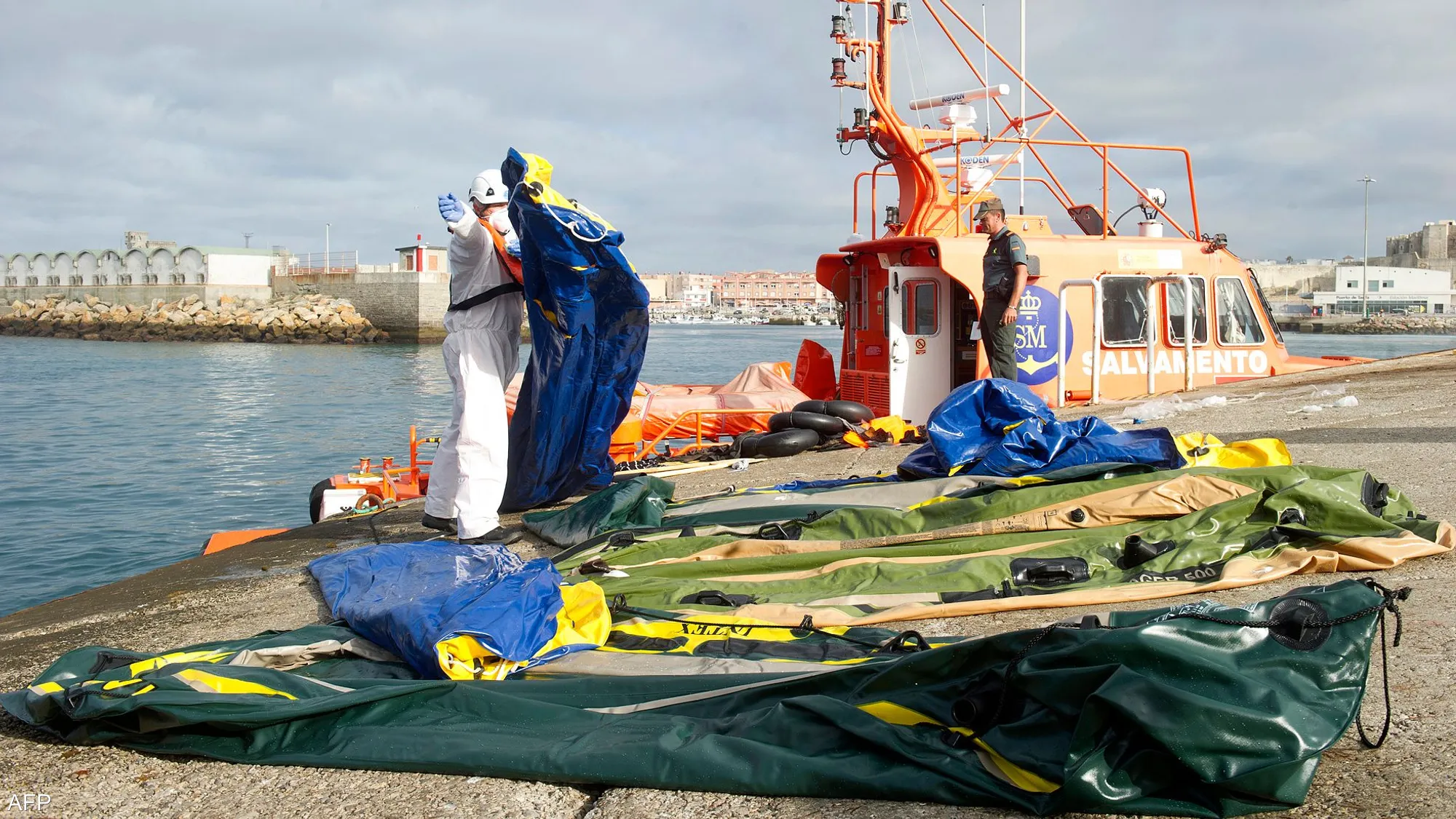 Spanish police officers during an operation targeting a migrant-smuggling network accused of arranging boat crossings from Ceuta to mainland Spain across the Strait of Gibraltar.