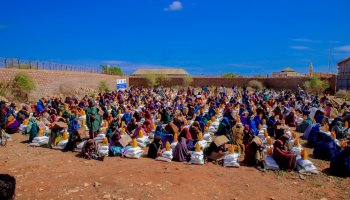 Somali Disaster Management Agency (SoDMA) officials distribute emergency food aid to vulnerable families in Baidoa on Tuesday, April 7, amid ongoing drought conditions.